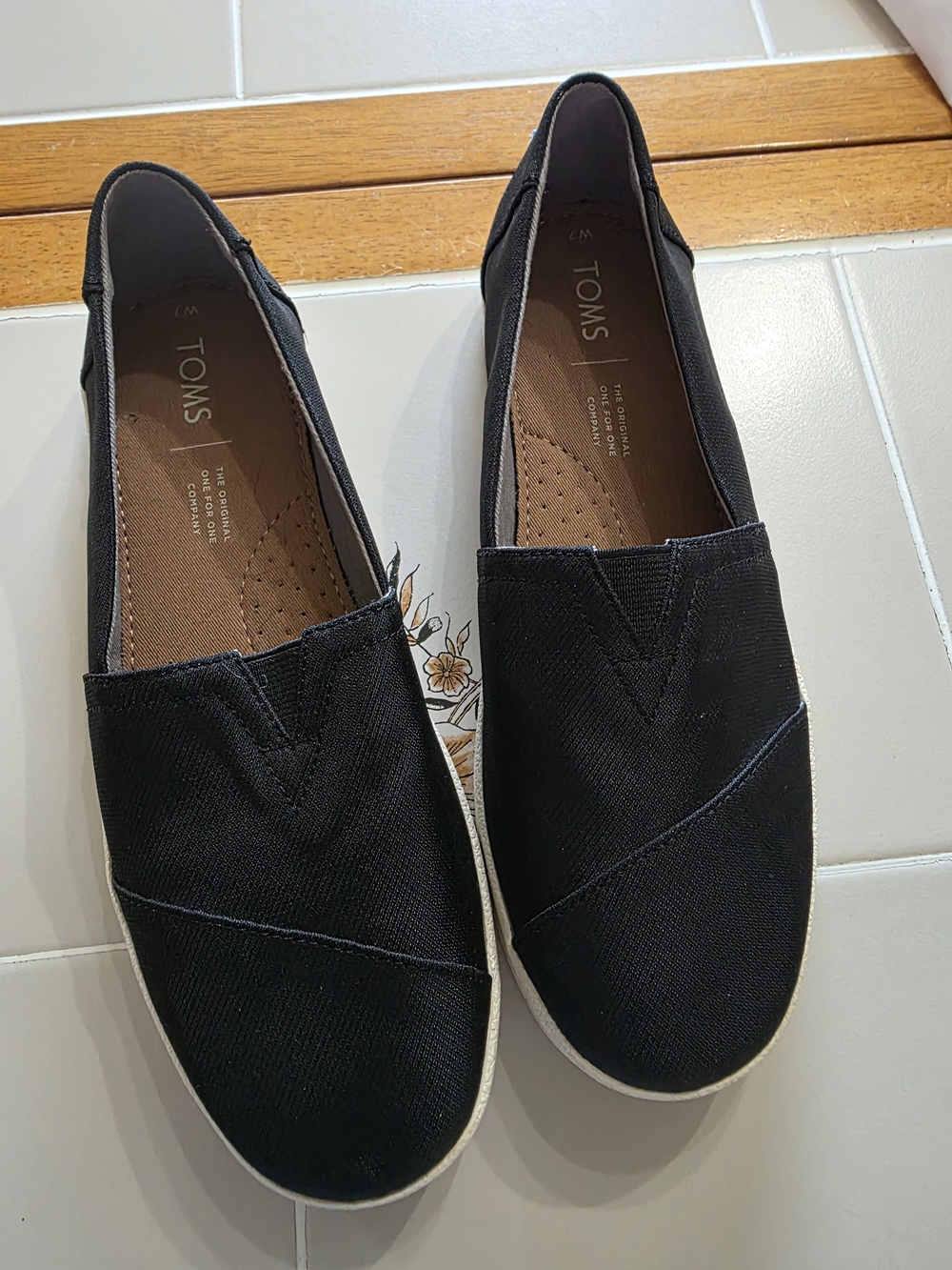 Toms Black Canvas Slip-On Shoes with Light Blue Logo Tabs